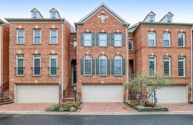 Move right into this beautiful 3-levelbrick townhome with a 2-car garage and exceptional upgrades throughout! photos photos