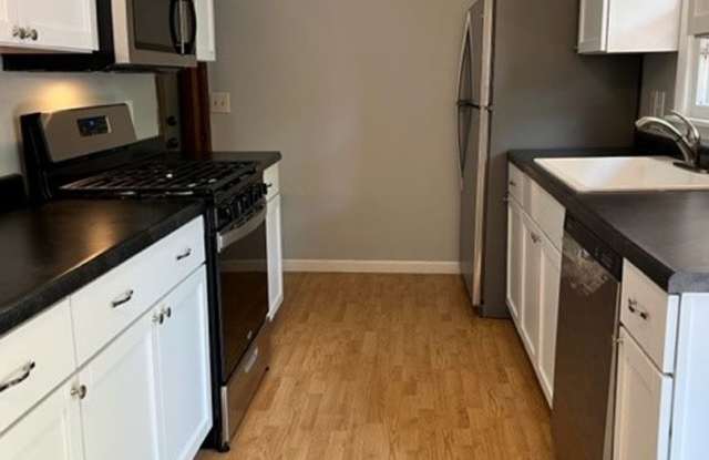 4-Bedroom Home with Finished Basement, Built-In Bar & Large Deck Gallery 3