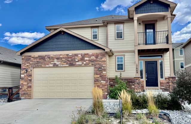 Beautifully Maintained Woodmoor Home Featuring 4 Beds/3.5 Baths, including Guest Suite with Private Bath, Upper Level Laundry and Mountain Views from your West Facing Balcony! Available for Immediate Move-in!! - 17849 Smelting Rock Drive, Monument, CO 80132