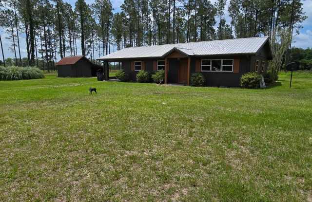 460 SE LESLIE WOOD LANE photos photos