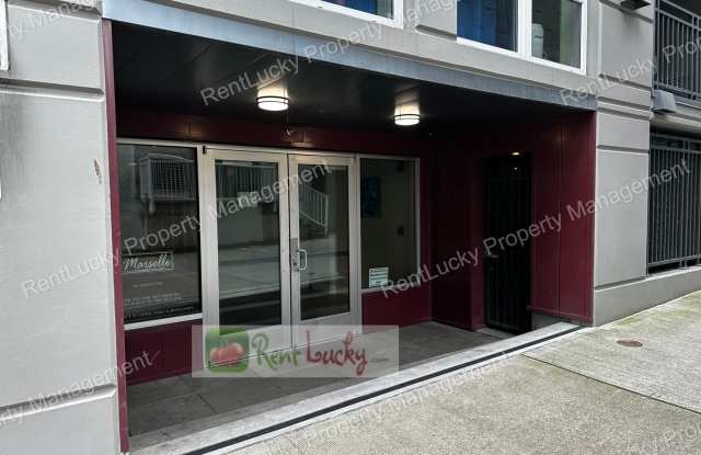 GORGEOUS!! 1 Bedroom + 2 Baths + Den w/Secured Parking Spot in Prime Seattle Location! photos photos