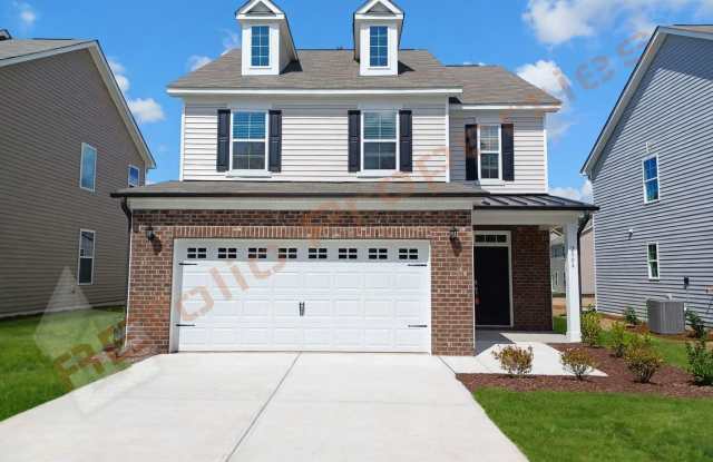 Move-in Ready! 4-Bedroom Home | Open Floorplan, 2-Car Garage & Extended Patio |  Convenient to Downtown Durham & RTP Gallery 1
