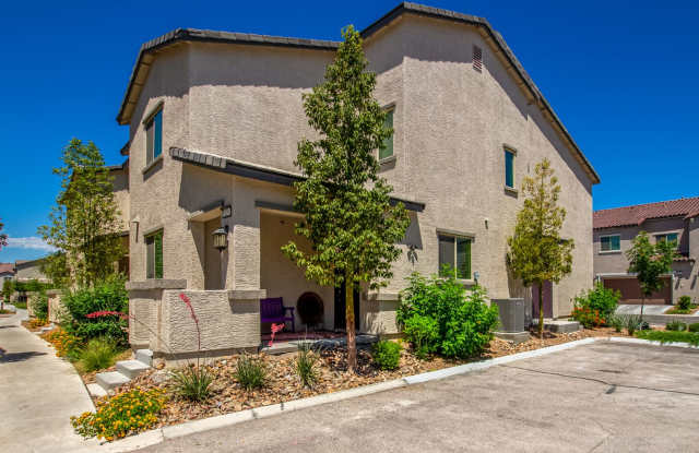 Beautiful corner lot townhome with custom paint, plentiful community green spaces. photos photos