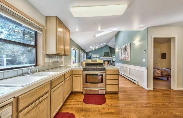 "Minnow's Run" ~ Top Floor Unit of Triplex with Private Deck, Wood Burning Fireplace & Fenced Back Yard photos photos