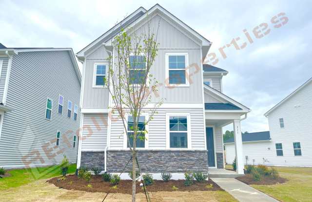 Gorgeous 4 Bedroom 3 Bath Home with Fiber Internet Included, 1st Floor Guest Suite with Attached 2 Car Rear Entry Garage in Edge of Auburn Subdivision, Raleigh, Available August 7! photos photos