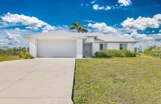 Modern Single-Family Home with 3 Bedrooms, Granite Kitchen, Walk-In Closet Covered Patio – Pets Allowed! - 815 Vogiantzis Parkway, Cape Coral, FL 33909 Modern Single-Family Home with 3 Bedrooms, Granite Kitchen, Walk-In Closet Covered Patio – Pets Allowed! - 815 Vogiantzis Parkway, Cape Coral, FL 33909