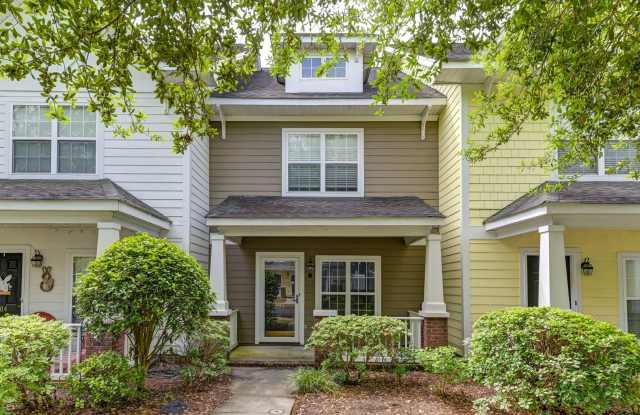This beautiful townhouse at 302 Hampton Forest Dr is move-in ready and boasts an exceptionally open floor plan! photos photos