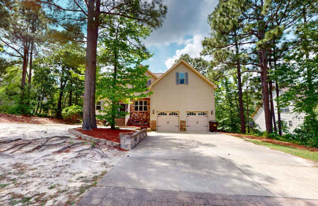 Large 5 Bedroom with Large Fenced in Back Yard in Carolina Lakes! - 1064 Coachman Way, Harnett County, NC 27332