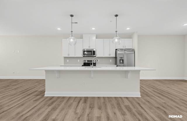 Brand-new 2026 construction Condo | 2,428 sq. ft. | 3 bedrooms | 2.5 baths | 1-car garage | Walk to Wegmans Gallery 4