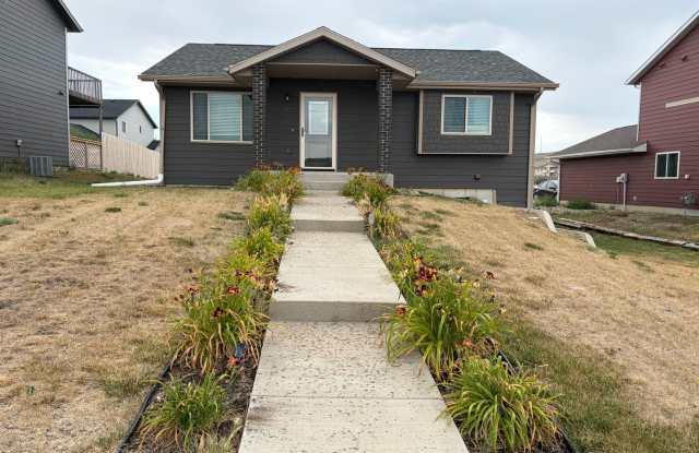 Modern 3-Bedroom Gem with Spacious Basement and Fenced Yard in Box Elder photos photos