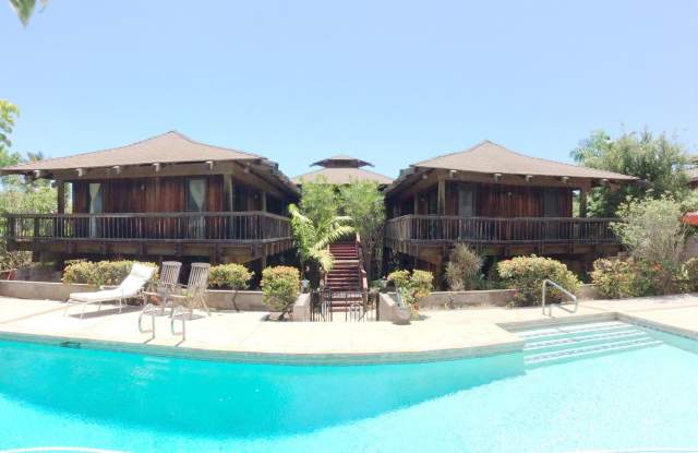 Very private, mostly furnished, rustic Maui Meadows home with large pool, walk around deck with panoramic ocean views. Available for 6 months only. Gallery 1