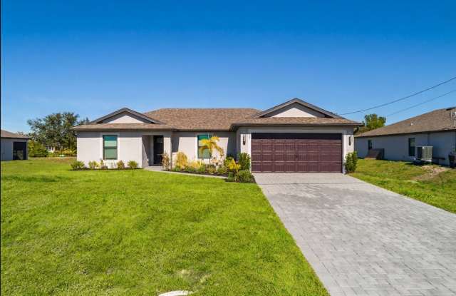 NOW AVAILABLE - 3/2 with 2 Car Garage in Mirror Lakes! photos photos