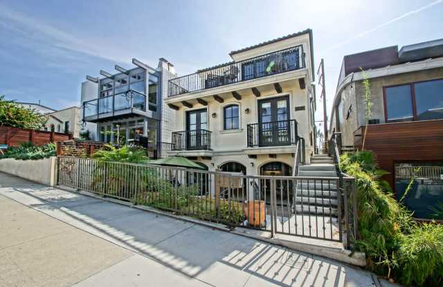 LUXURIOUS  FULLY FURNISHED, 2800 SQ FT WALKSTREET HOME W/ GREAT OCEAN VIEWS, LARGE DECK, 3 BALCONIES  LARGE PATIO NEAR HB/MB BORDER  150 YARDS TO BEACH! - 242 31st Street, Hermosa Beach, CA 90254