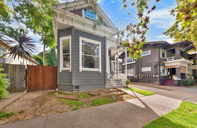Fully Updated 2BR/2BA Victorian with Private Yard and Driveway Parking! photos photos