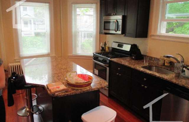 Nicely renovated 3 bed unit with in-unit laundry. photos photos