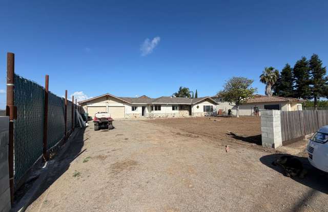 Spacious 4-Bedroom Home on Expansive Lot in the Outskirts of Elk Grove- MORE PHOTOS TO COME! photos photos