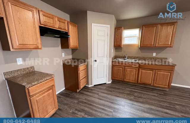New Beginnings Start with AMRR –  Charming 3 Bedrooms, 2 Baths & Room to Make It Yours Gallery 4
