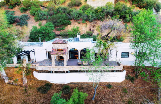 Fully Furnished Luxurious Spanish Mediterranean Villa in Hollywood Hills: 4-Bedroom, 2.5-Bath Retreat with 1.3 Acres, Canyon Views  Resort-Style Amenities! photos photos