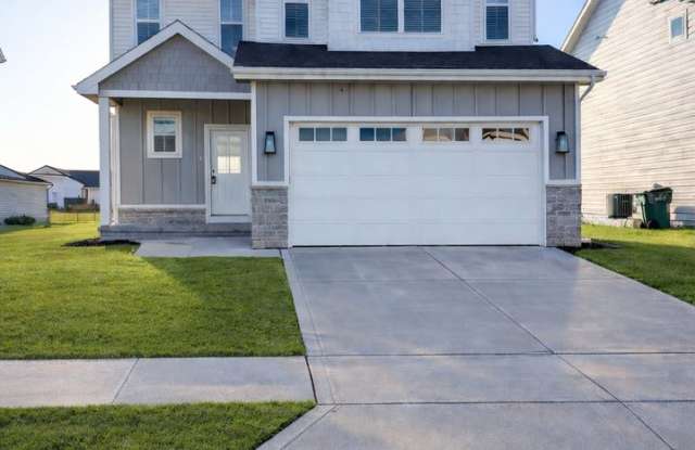 Spacious 4-Bedroom Home with 2-Car Garage  Yard - 1505 Northeast Savana Drive, Grimes, IA 50111