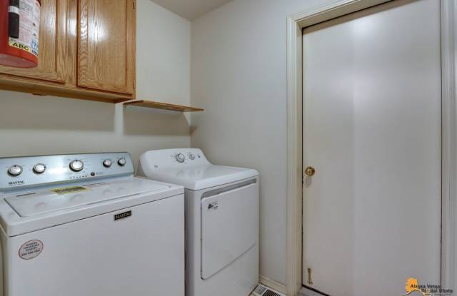 East Anchorage Condo with Fenced in Yard, W/D in unit,  2 Car Garage! Close to JBER, Baxter Bog Park, and Baxter Elementary School. photos photos