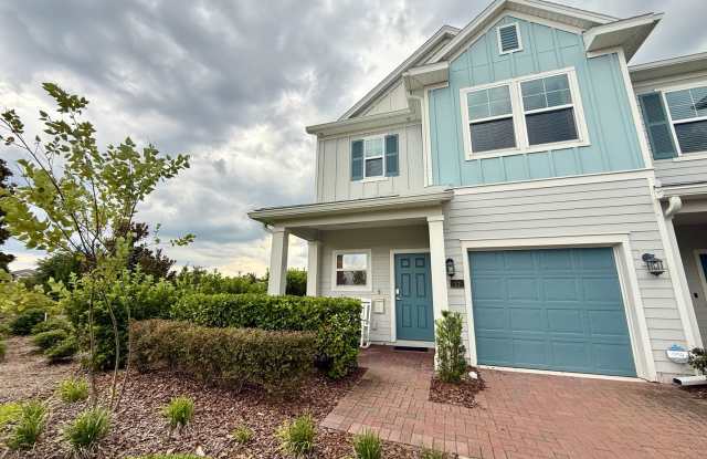 BEAUTIFUL END-UNIT TOWNHOME WITH SCREENED PATIO AND LAKE VIEWS photos photos