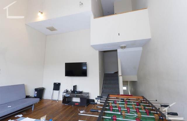 Huge Townhouse near T w Laundry in Unit! 30 Foot Ceilings in Living Room! photos photos