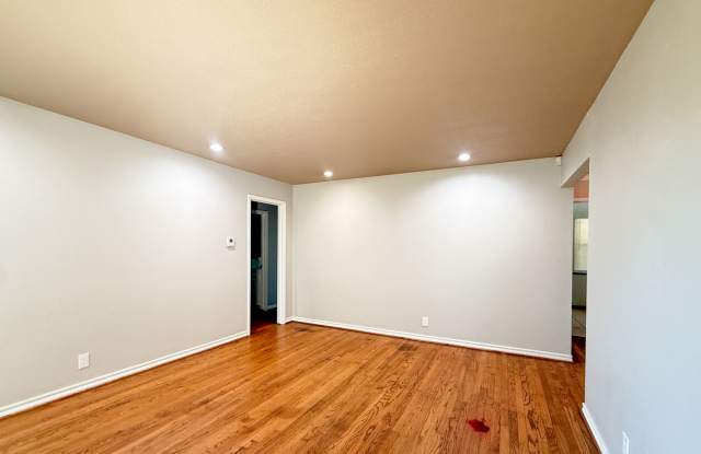 3116 NW 65th St | Hardwood Floors + Sunroom | NW OKC Gallery 1