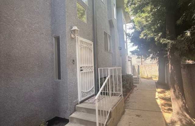 Beautifully Renovated 3-Bedroom Townhome in Gated Harbor City Community Gallery 1