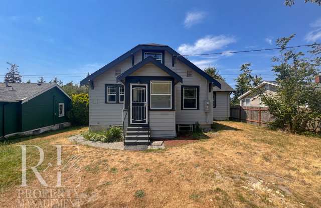 Beautifully Renovated Classic Home with Three Levels of Living, Sunroom & Spacious Kitchen photos photos