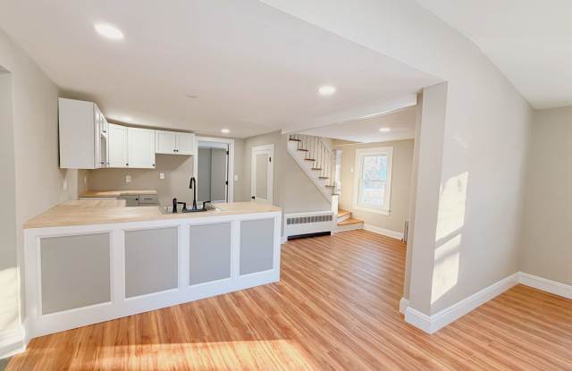 Modern Renovated 2-Bedroom Single-Family Home with Large Yard and Laundry Hook-Ups photos photos