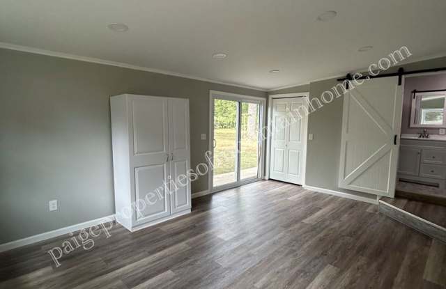 Stunning 4-bedroom, 2-bath Home with Attached Garage photos photos