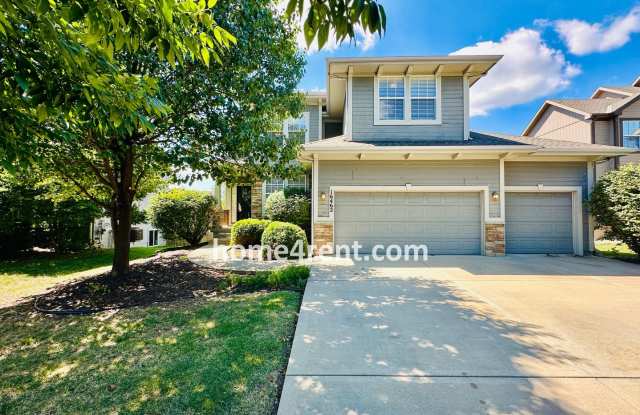 Gorgeous Olathe, 5 BR Home w/ Wood floors, Updated Kitchen, Freshly Painted, Finished Basement and a 3 Car Garage! photos photos