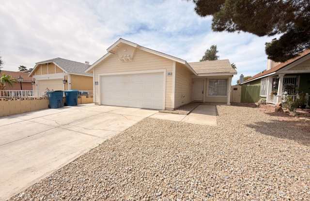 Welcome to this charming single-story home located in the Sunrise Manor! photos photos