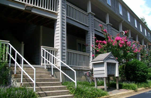 Walk to Campus from this spacious, updated 4br 2ba townhome-style condo! Gallery 3