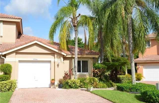 5766 NW 127th Ter photos photos
