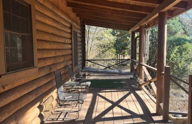 Available now! Log Cabin in Oconee on a 1.357 acre neighborhood wooded lot! Gallery 4