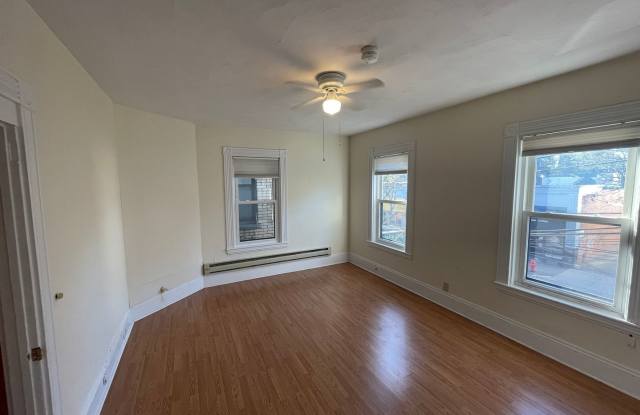 Large 1-bed apartment above shops in Newton Highlands next to Green Line photos photos