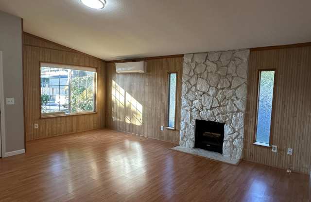 Spacious  Stylish 3BD Home with Iconic Stone Fireplace + Soaking Tub photos photos