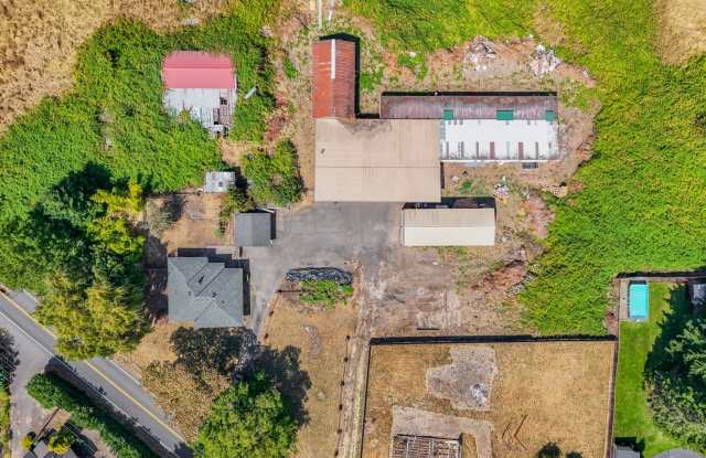 Rare 7-acre property - renovated 3 bed, 2 bath home, with powered barn! photos photos