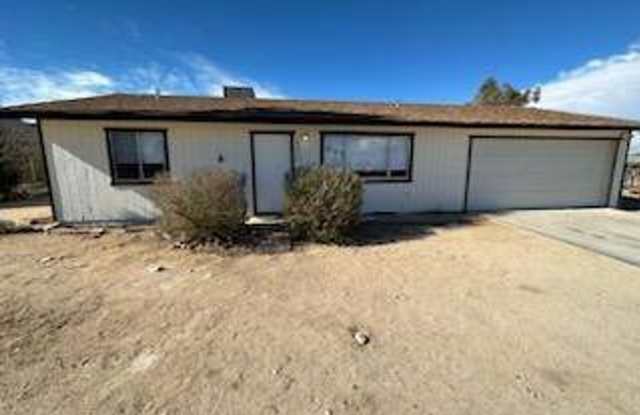 Well-maintained 2-bedroom, 1-bath home located near the 29 Palms Marine Base and Tortoise Rock Casino photos photos