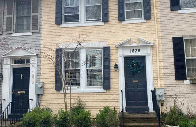 The Charm that Defines Georgetown is Captured in this 2 bedroom 2 bathroom Townhome - 1628 33rd Street Northwest, Washington, DC 20007