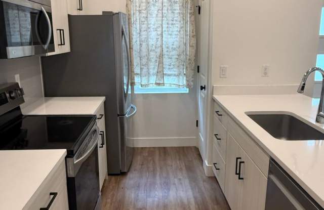 Beautiful townhome with 2 car garage, central air, pickleball court and laundry hookups. photos photos