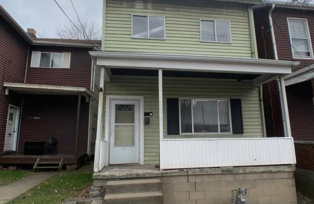 Great 2 bed 2 bath with bonus attic space house located steps from shopping. photos photos