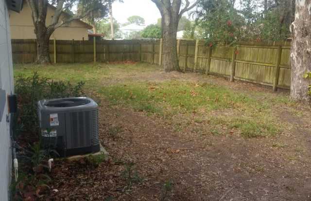 Cozy and Roomy! Nice corner lot home 2 Bedrooms 2 Baths with 1 car garage and huge backyard. Pets consider! - 895 Dupont Street Northeast, Palm Bay, FL 32907