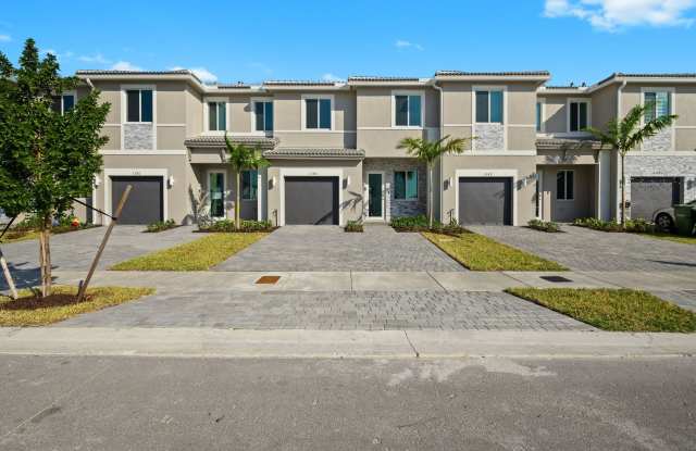 Discover sophisticated urban living in this exquisite brand new 3 bed 3.5 bath Townhouse with yard, garage and impact-resistant windows within Luxurious Community Terra Sol photos photos