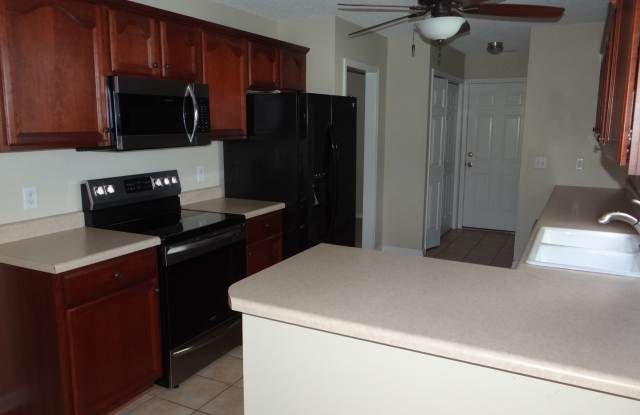 Lovely 3 bedroom 2 bath home in 55 and older neighborhood with 2 car garage Gallery 4