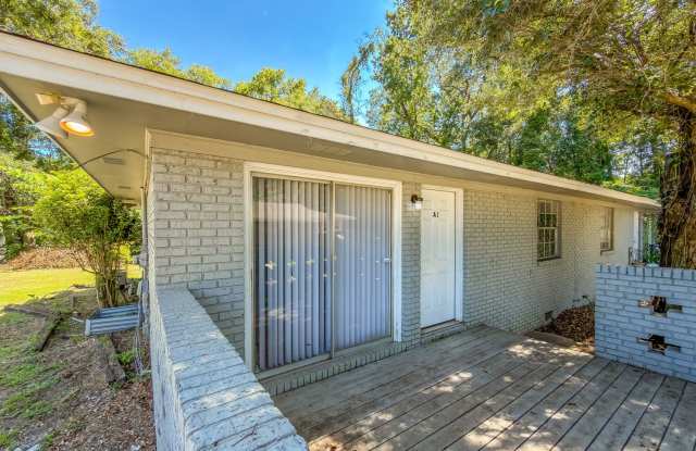 RENOVATED 2/1 w/ New Flooring/Paint, Fenced Yard, Deck, Walk In Closets, Granite Counters, & Stainless Appliances ! Avail NOW for $1375/month photos photos