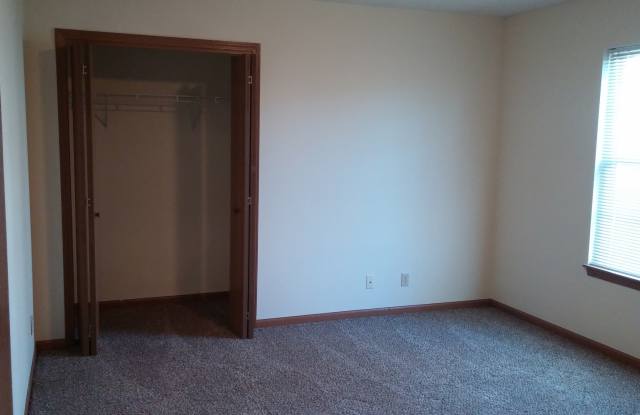 Wake up to a stunning pond view in this beautiful 2 BD 2BA duplex with a 2 car attached garage photos photos