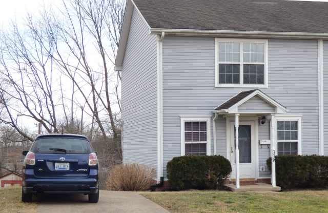 Lovely, Spacious Townhouse! Off-Street Parking, W/D Included, Full Basement, Pets Ok! photos photos