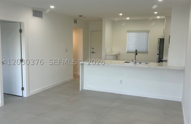 7732 Camino Real Gallery 1